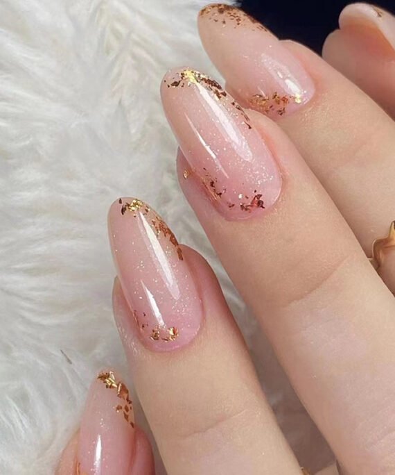 Glittery nude nails